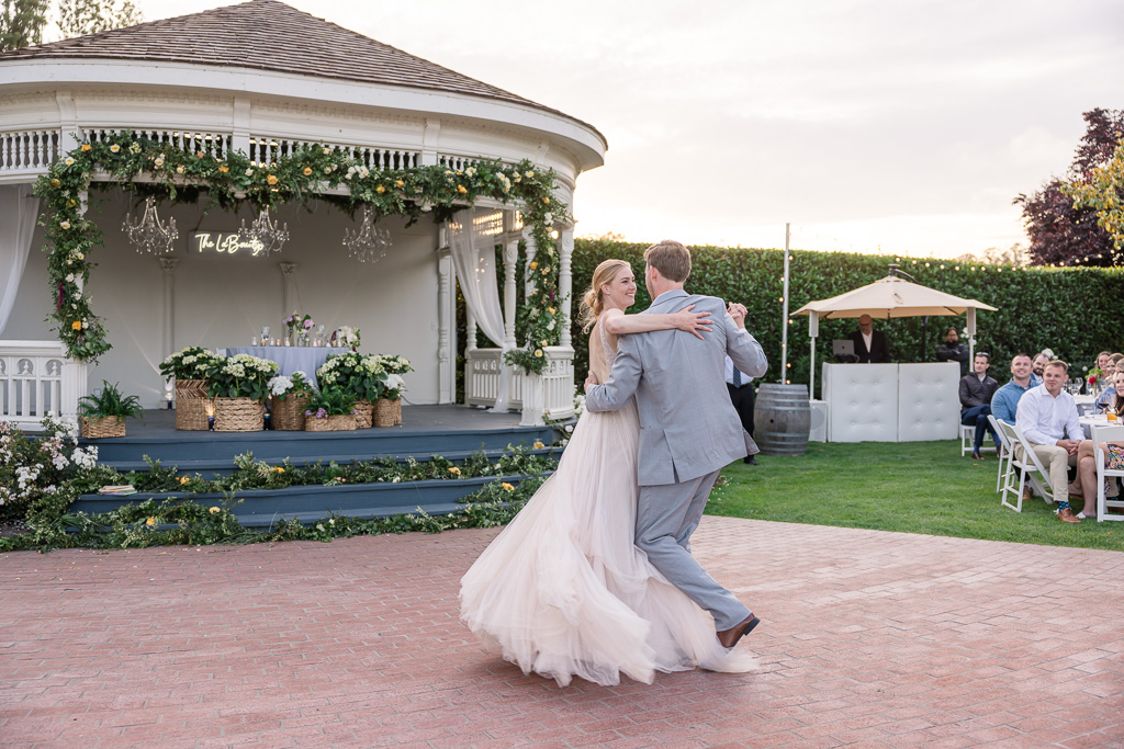 bride and groom's first dance at sunset at Garden Valley Ranch