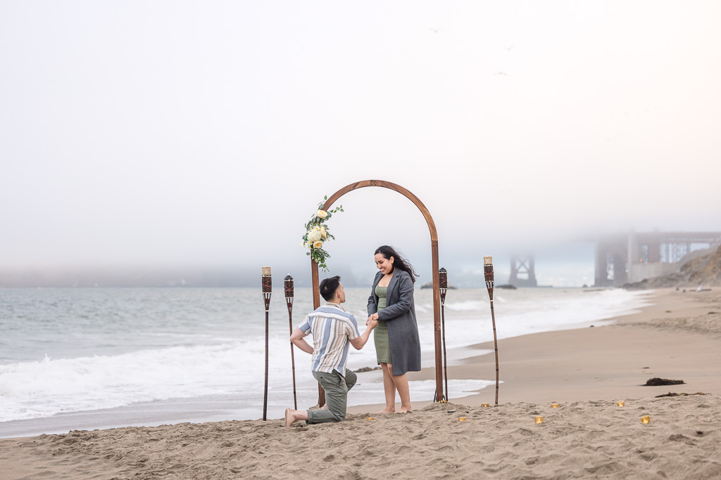 marriage proposal at Baker Beach under foggy weather