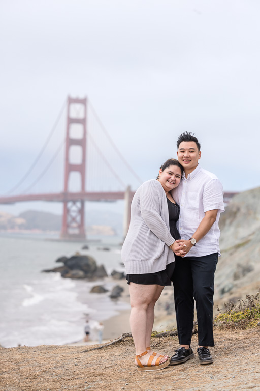 cute couple in front of the Golden Gate Bridge