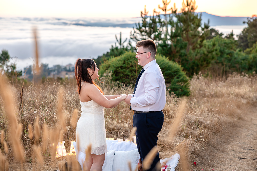 surprise proposal over a blanket of fog