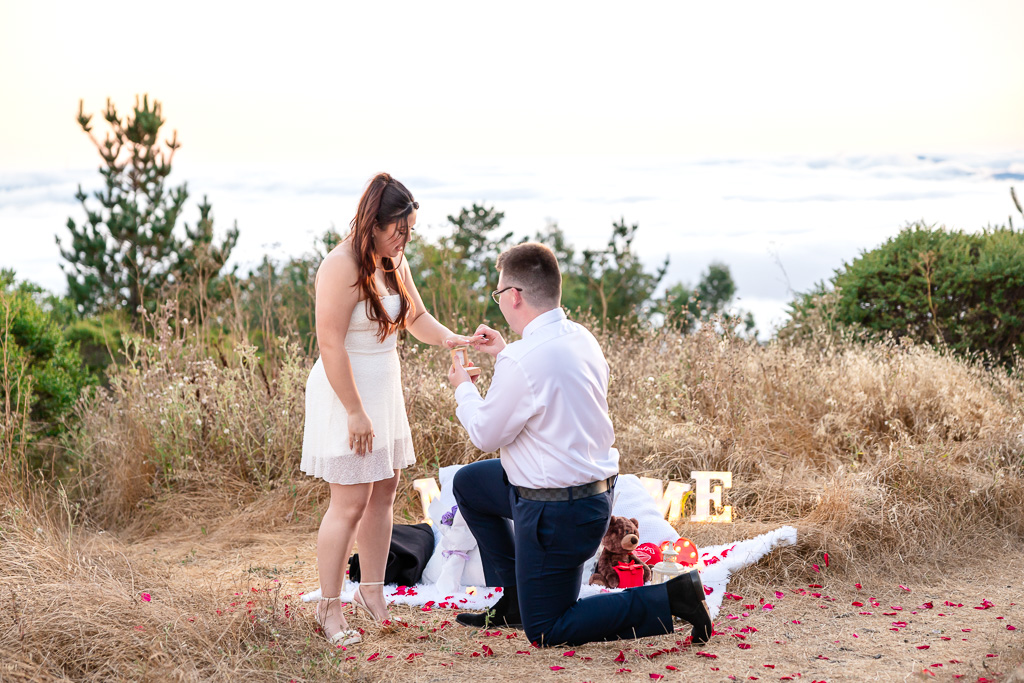 marriage proposal with thick fog in the distance