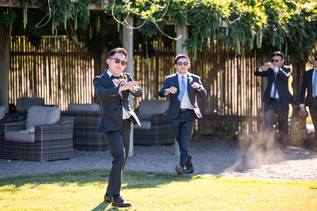 groom and groomsmen performing a surprise dance into the ceremony