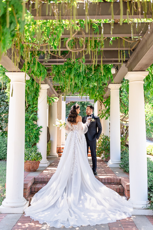 couple portrait at a covered walkway