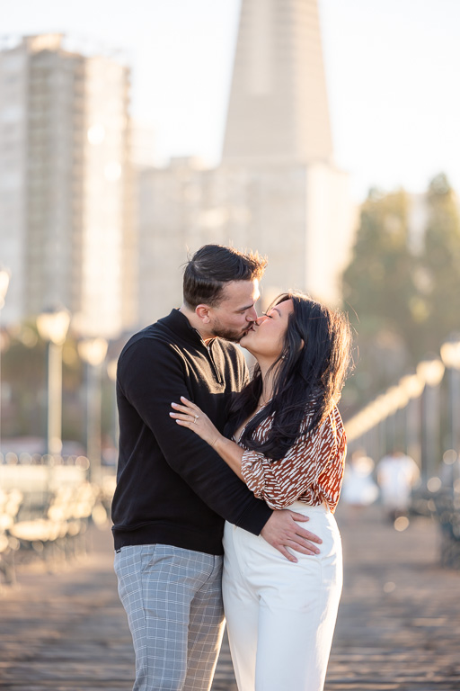 kissing engagement pic at Pier 7 SF
