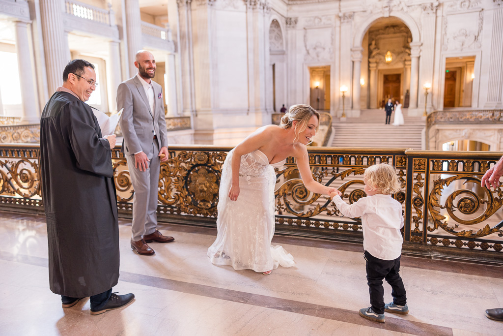 toddler acting as ringbearer during elopement at SF City Hall
