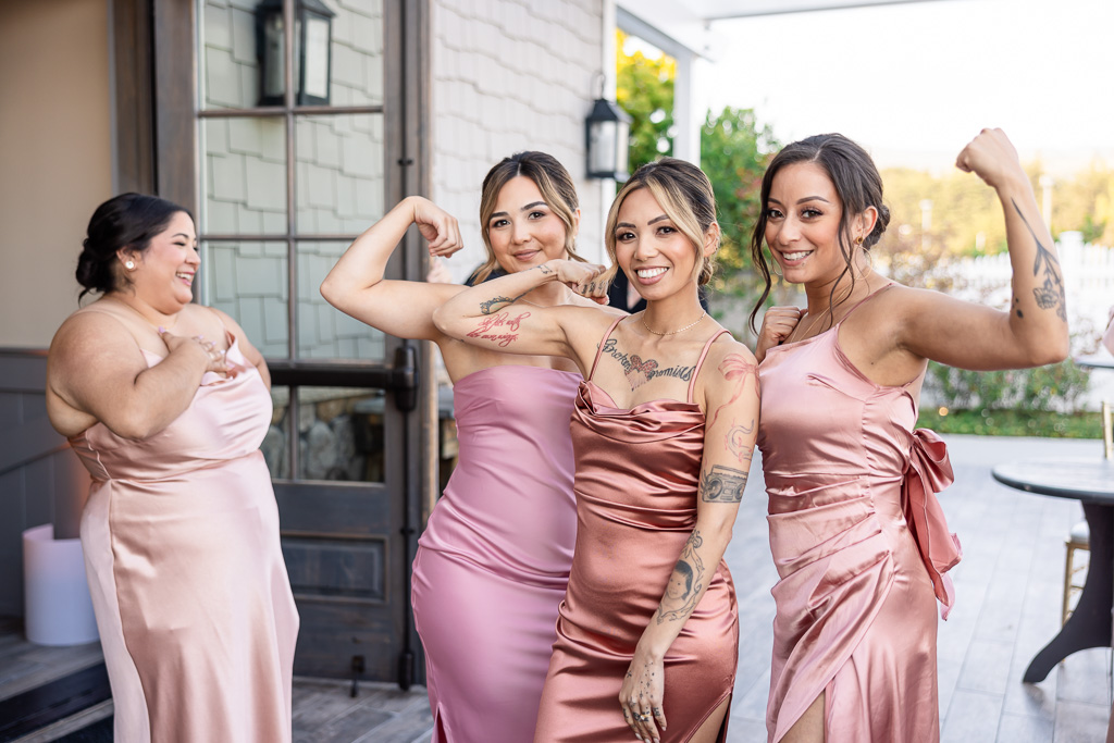 bridesmaids showing off their biceps