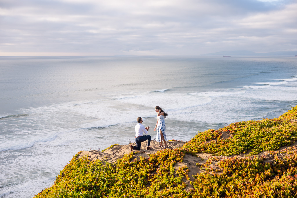surprise proposal on a cliff over the Pacific Ocean