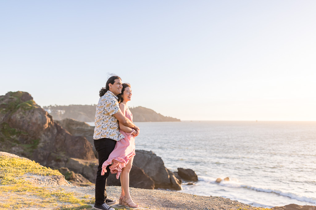 sunset engagement session on ocean bluffs near San Francisco