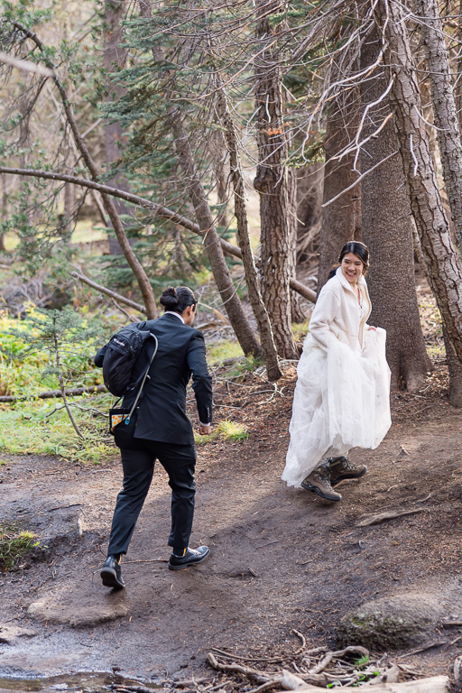 hiking national park in wedding dress and tux