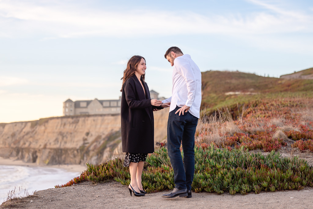 couple about to be proposed to at the Half Moon Bay in Ritz-Carlton