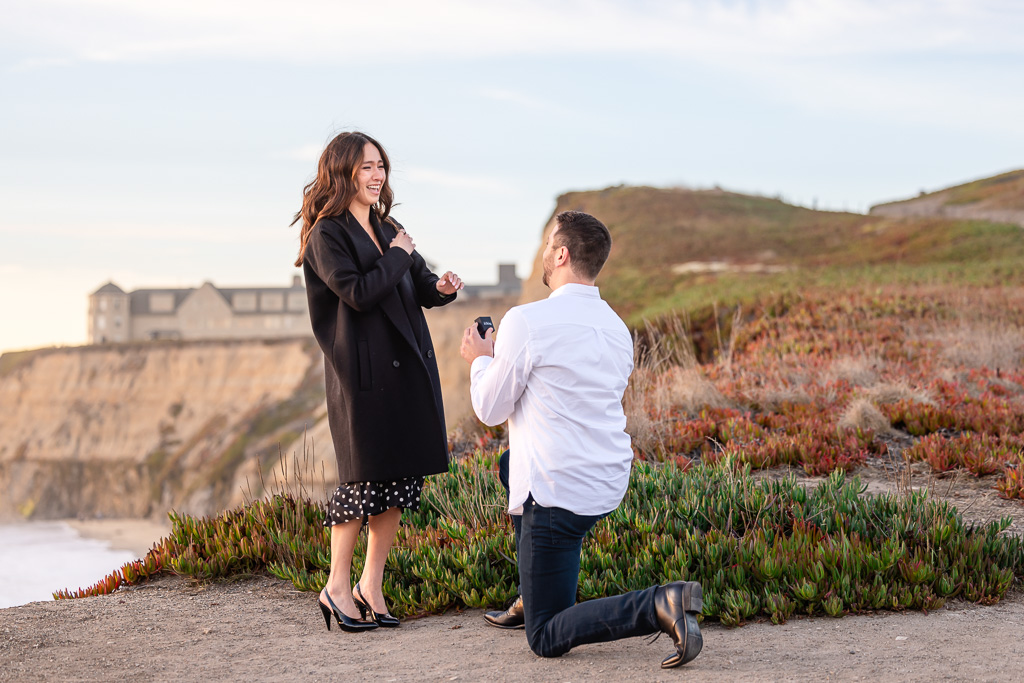 very happy reaction to surprise proposal in Half Moon Bay