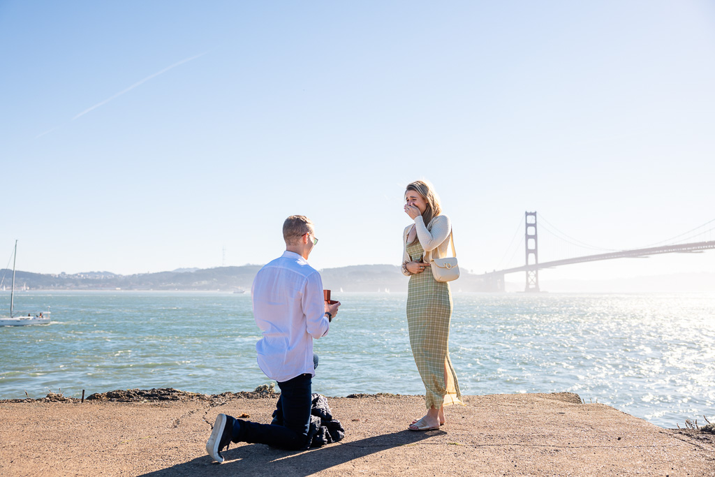 beautiful surprise proposal at the Golden Gate Bridge on the north end