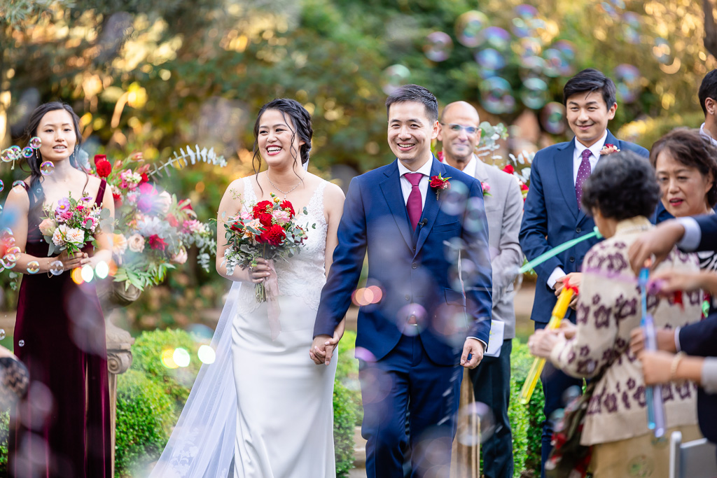 colorful bubbles during wedding recessional