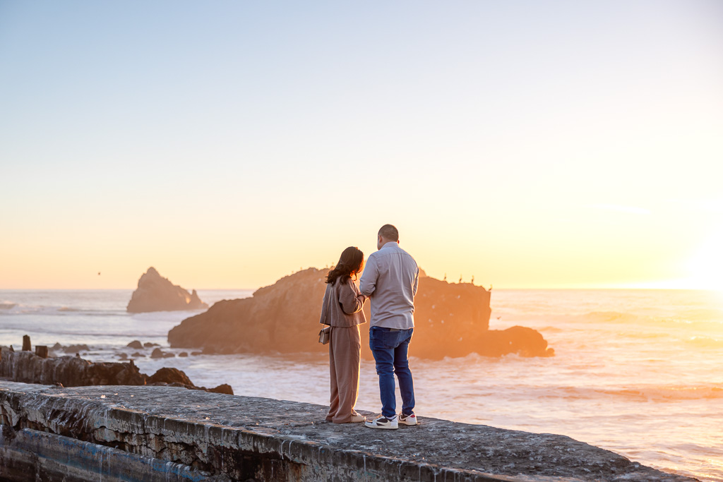 couple standing on the Sutro Baths ruins