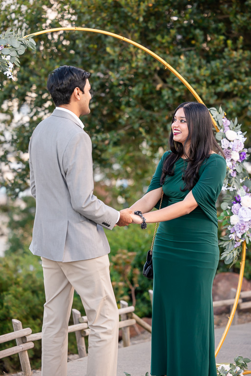 surprise proposal with floral arch