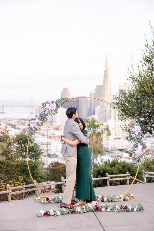 hugging in front of the SF skyline view