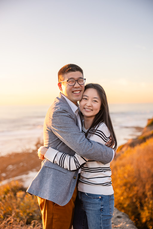 El Granada engagement photos by the ocean at sunset