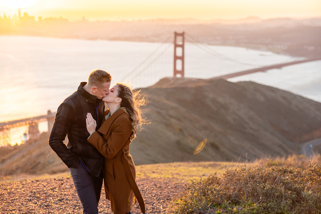 engagement photos at sunrise at the Golden Gate Bridge