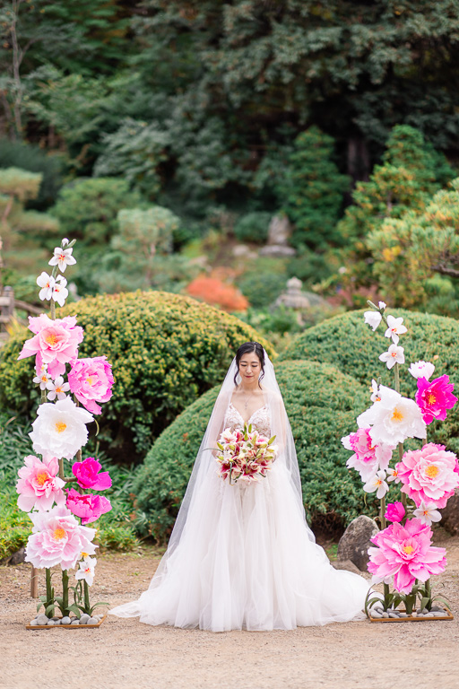 Hakone Gardens wedding with DIY crepe paper flower ceremony arch made by the bride