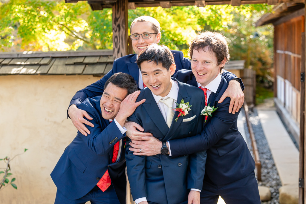 fun photo of groom with his groomsmen