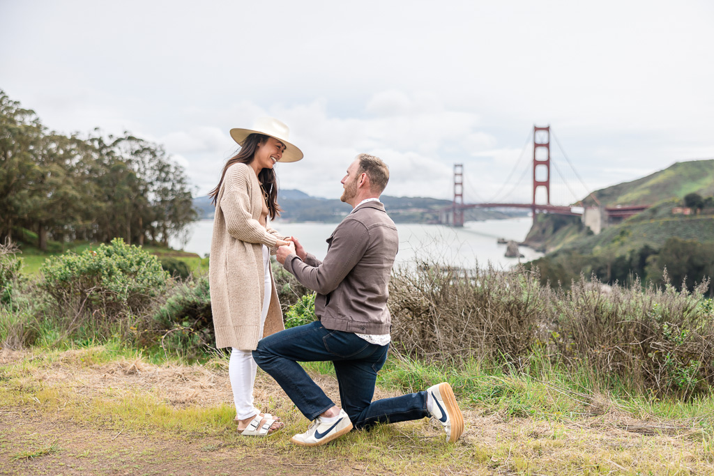 surprise proposal above Cavallo Point with the Golden Gate Bridge in the background