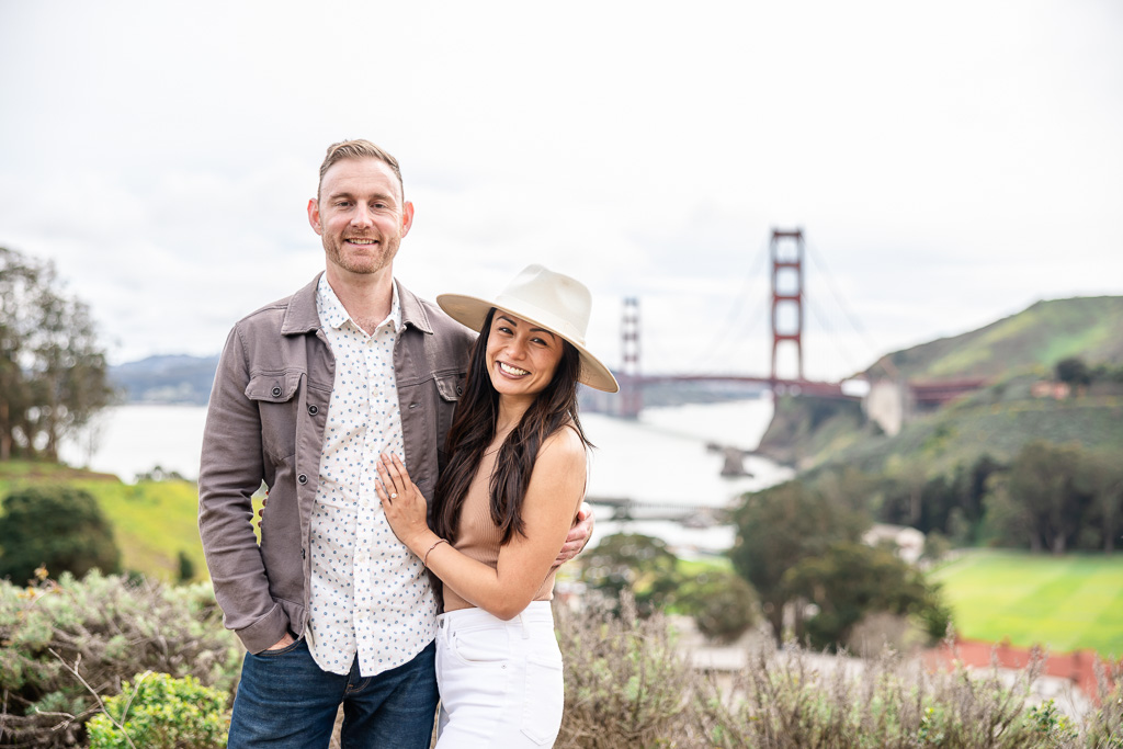 cute couple in front of the Golden Gate Bridge
