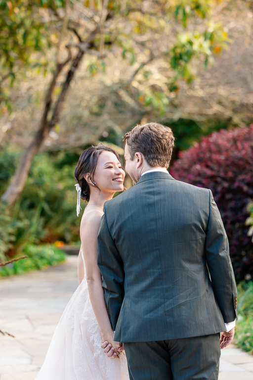 bride and groom looking at each other lovingly