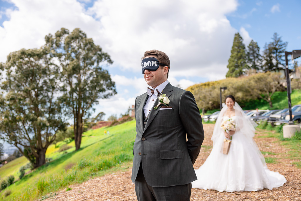 bride walking up to groom for first look