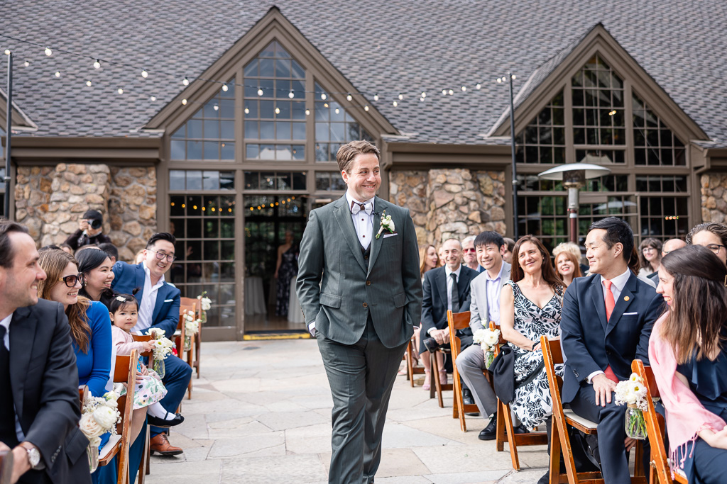 groom walking down the aisle