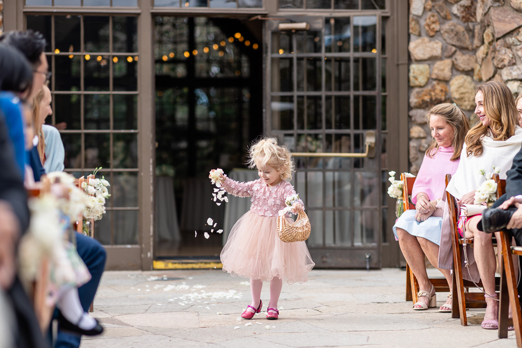 flower girl spreading petals at The Brazilian Room