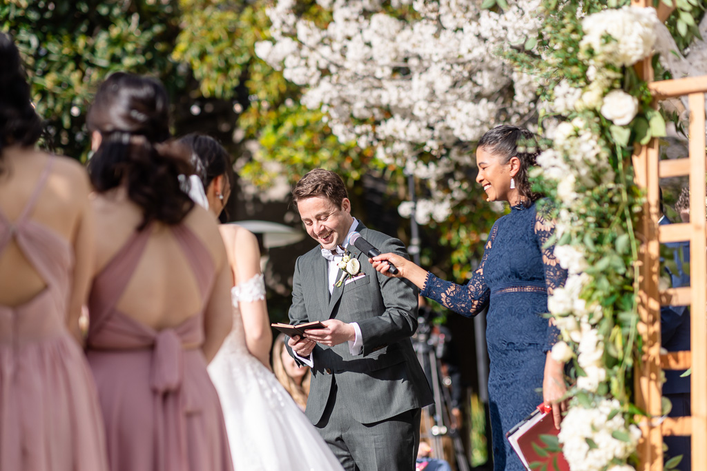 groom delivering his personal vows during wedding ceremony