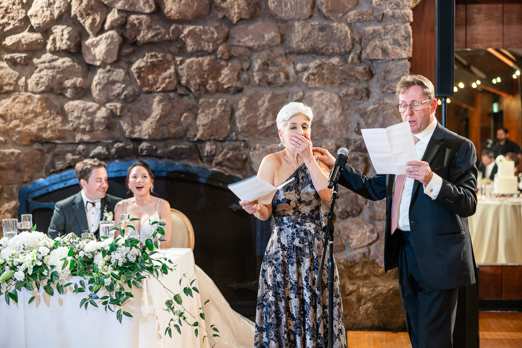 parents of the groom giving a funny dinner toast