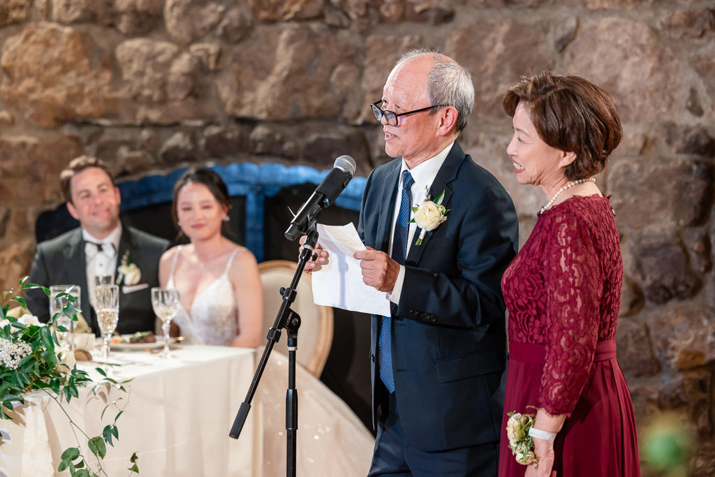 parents of the bride giving a speech to the couple