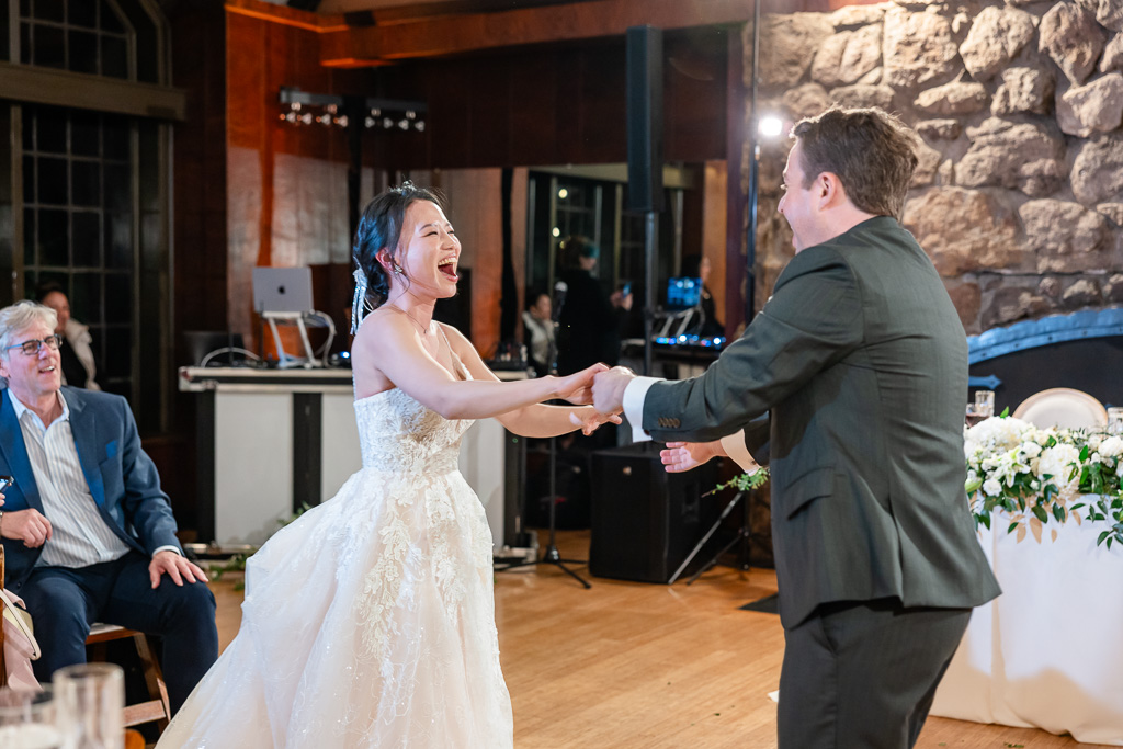 candid shot of newlywed first dance