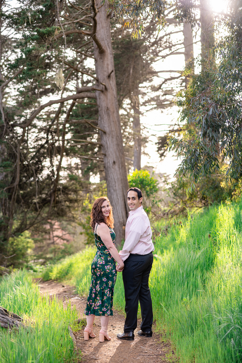 Stow Lake engagement photos near some trees