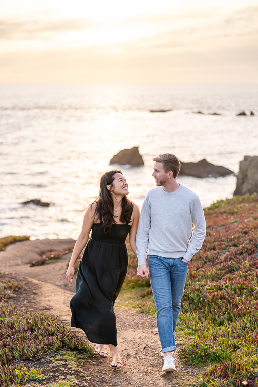 sunset engagement photos on Rodeo Beach cliff trail