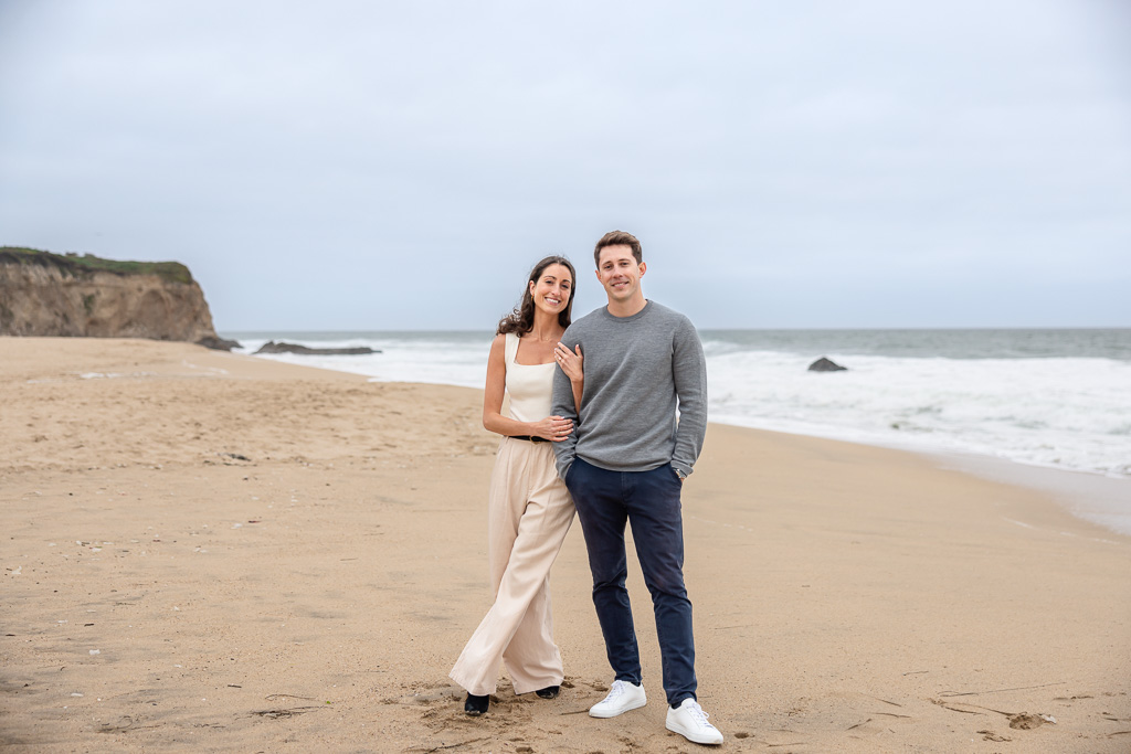 casual engagement photos on the beach