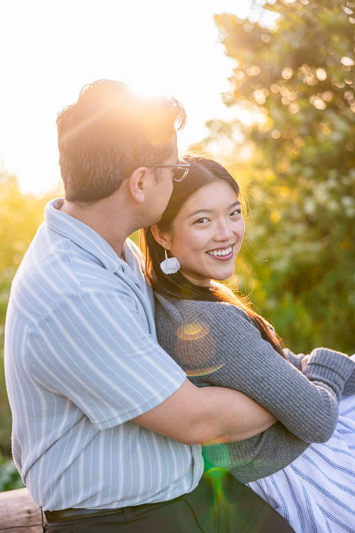 sun flare engagement photos