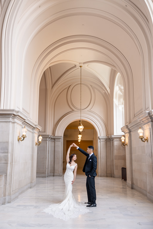 dancing in a wedding dress inside San Francisco City Hall