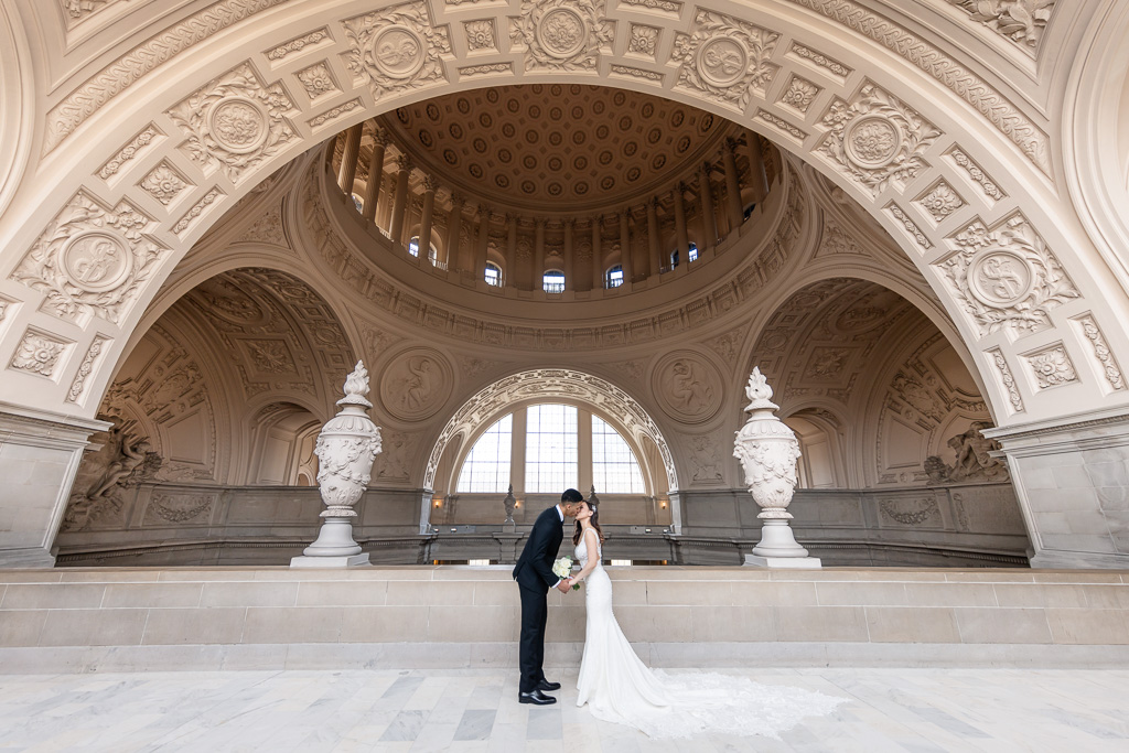 wide angle shot of bride and groom at SF City Hall