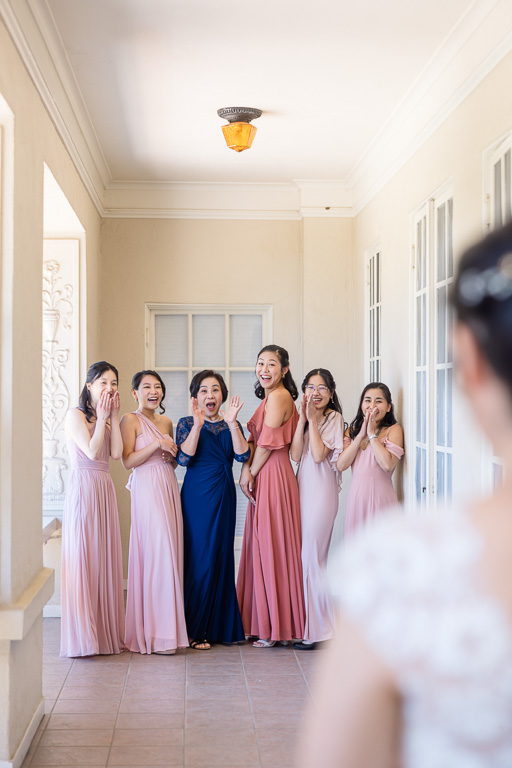 bride and bridesmaids first look