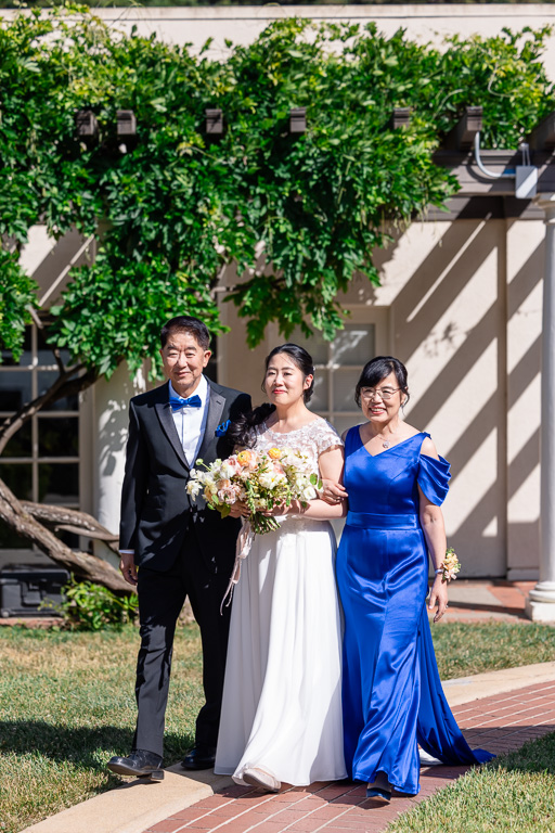 bride with her parents