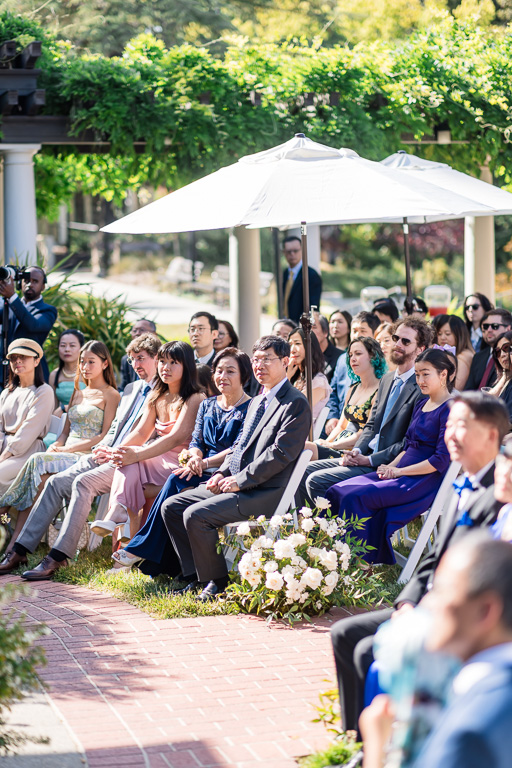 parents and guests seated during ceremony