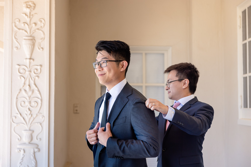 groom and best man getting ready