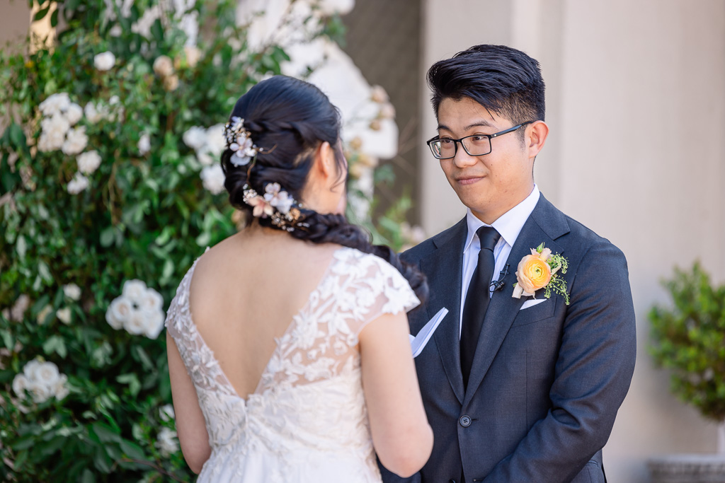 bride reading personal vows to groom