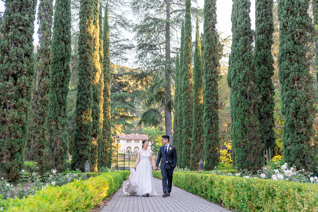 bride and groom walking in the Italianate Garden