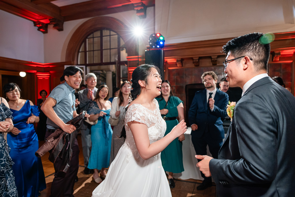 bride and groom dancing with guests at Montalvo Arts Center