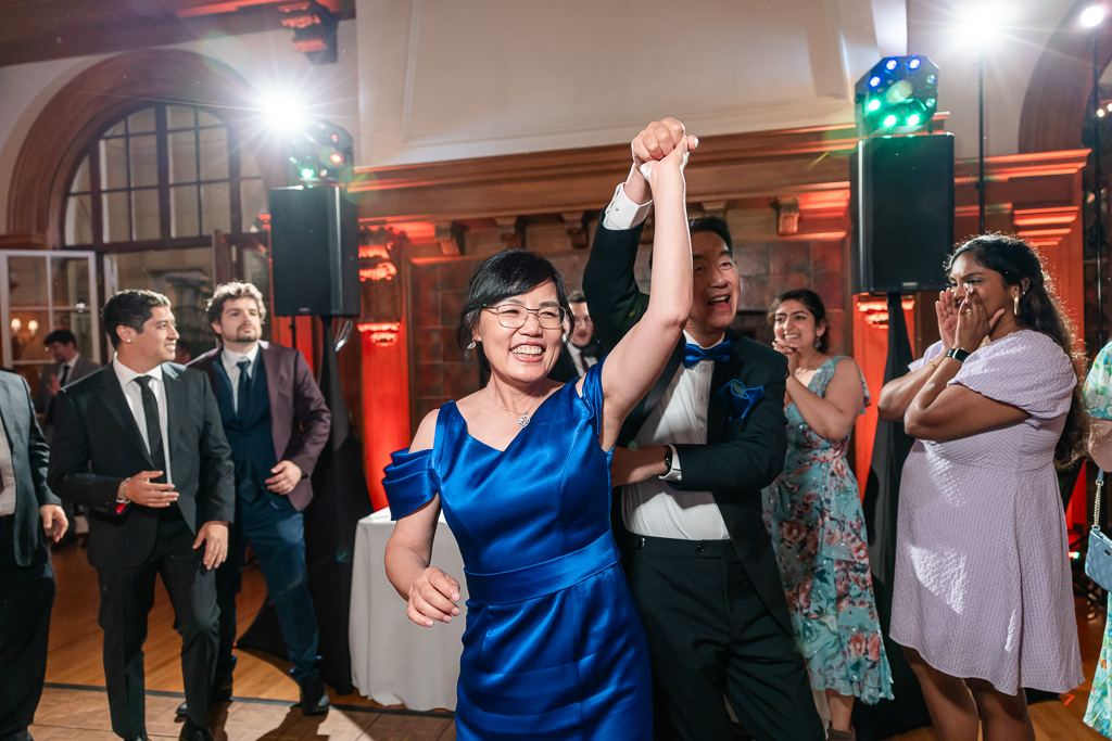 bride's parents dancing together on the dance floor