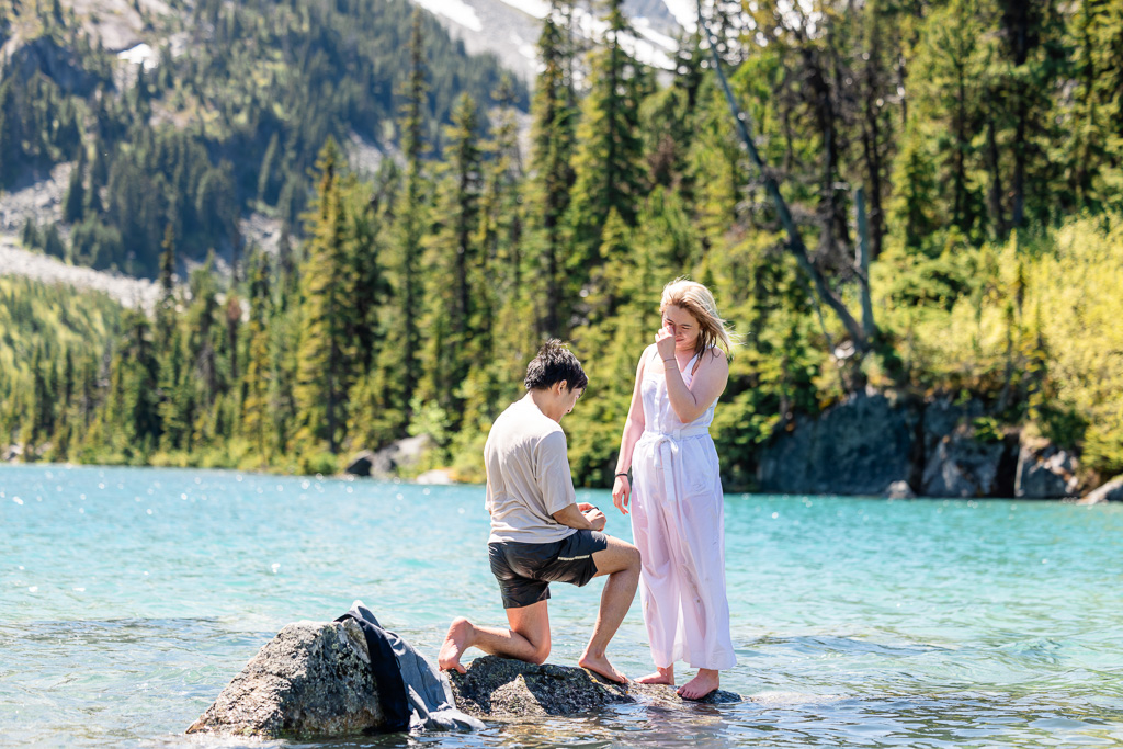 marriage proposal at Upper Joffre Lake in the glacial water