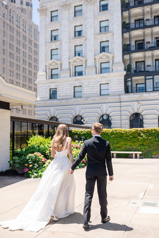 candid wedding photo at the Fairmont SF garden rooftop